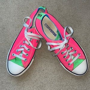 Bright pink and lime green CONVERSE Chuck Taylor All-Stars low-top sneakers